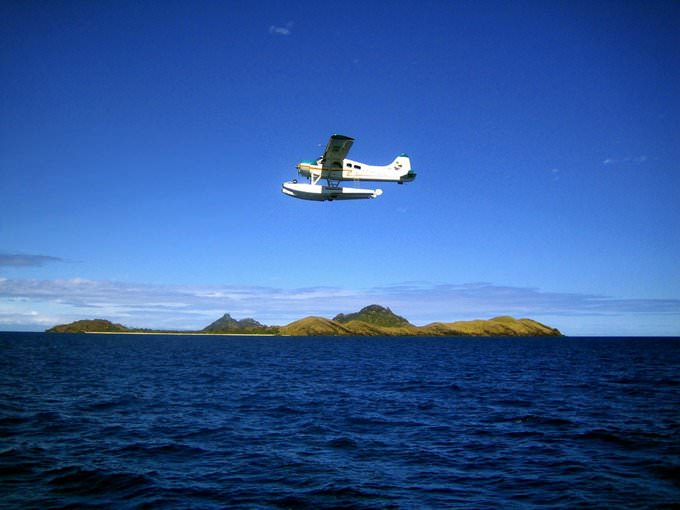 A plane flies over the Mamanucas